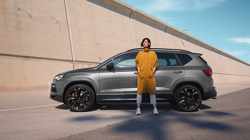 woman-standing-next-to-cupra-ateca-2020-rodium-grey-colour